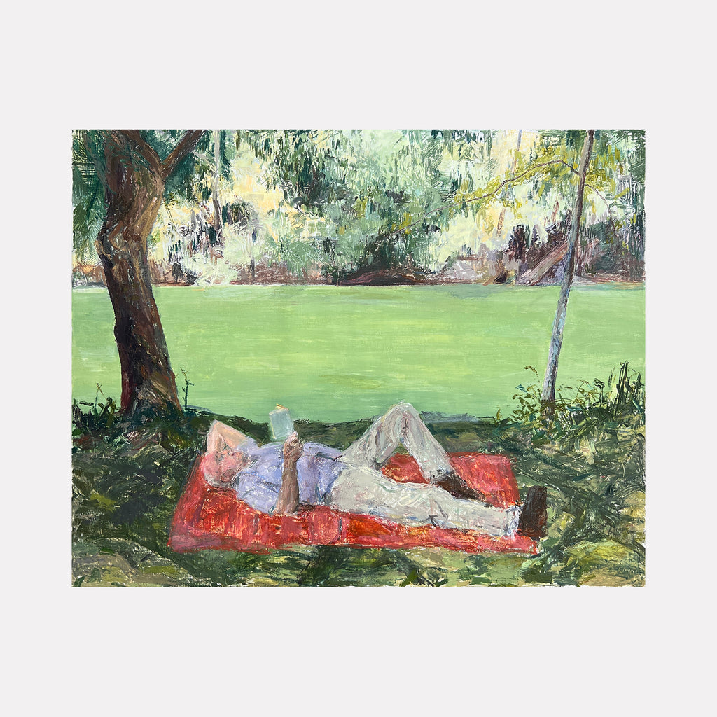 The artwork "Andy sur Seine" by Catherine Webb depicts a relaxed figure reclining on a vibrant red blanket beneath trees by a green riverside. The textured brushwork and natural palette evoke the intimate, contemplative scenes of Impressionists like Claude Monet and the serene stillness of David Hockney’s landscapes.