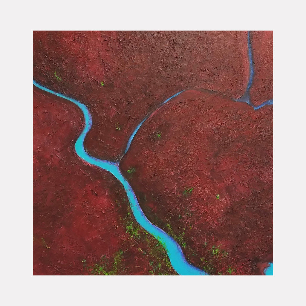 The artwork "51 Square Miles" features a textured abstract landscape with deep red and earthy brown tones, intersected by vibrant, winding blue lines resembling rivers or pathways. Small green patches add contrast and depth, highlighting the naturalistic style. Created by Anne Cherubim.