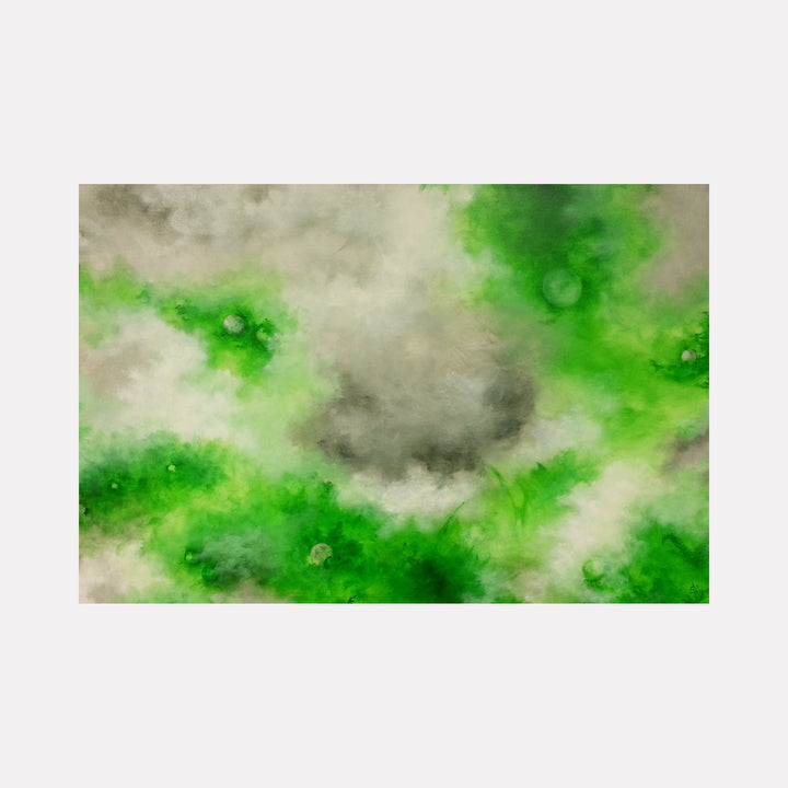 The artwork "In Between" by Anne Cherubim features an abstract composition with soft, swirling textures in shades of green and gray. The piece uses a blend of muted and vibrant tones to evoke a misty, ethereal atmosphere, with organic shapes that suggest natural forms or landscapes. Anne Cherubim.