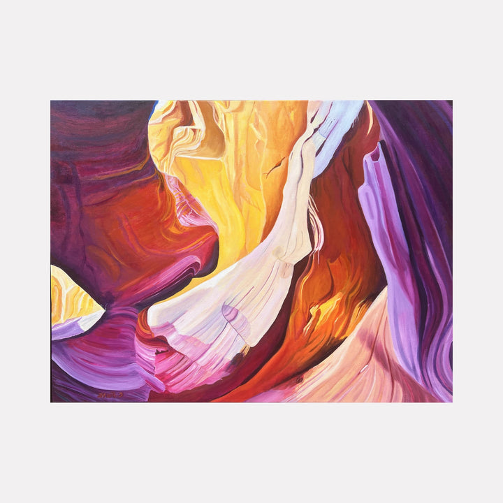 The artwork "Antelope Canyon 1" by Connie Falk features flowing, abstract rock formations in warm hues of gold, orange, purple, and pink, reminiscent of the natural erosion patterns found in slot canyons. Its vibrant palette and smooth, curving textures evoke the style of Georgia O’Keeffe’s organic abstractions and the luminous color blending found in J.M.W. Turner’s landscapes.