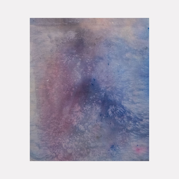 The artwork 'At Any Moment' features ethereal washes of color blending from misty blue to soft purple and subtle pink, creating a dreamlike atmospheric effect on unprimed canvas. The textural brushwork suggests a celestial or cloudy landscape with delicate color transitions. By Kristin Gaudio Endsley.