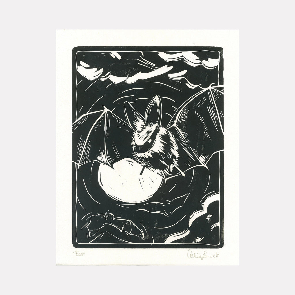 The artwork "Bat" by Ashley Ranae Quick depicts a detailed black and white illustration of a bat in flight with outstretched wings against a night sky filled with swirling clouds and a full moon. The style resembles a woodcut print with bold lines and textured shading, emphasizing the bat’s fur and wing membranes. Ashley Ranae Quick