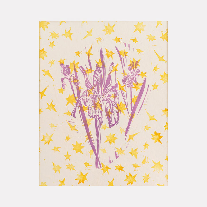 The artwork "Betty" features a central bouquet of stylized purple irises with intricate line details, set against a light beige background adorned with scattered yellow star shapes. The piece combines natural floral elements with abstract star patterns, creating a harmonious blend of organic and geometric forms. By Ashley Ranae Quick.