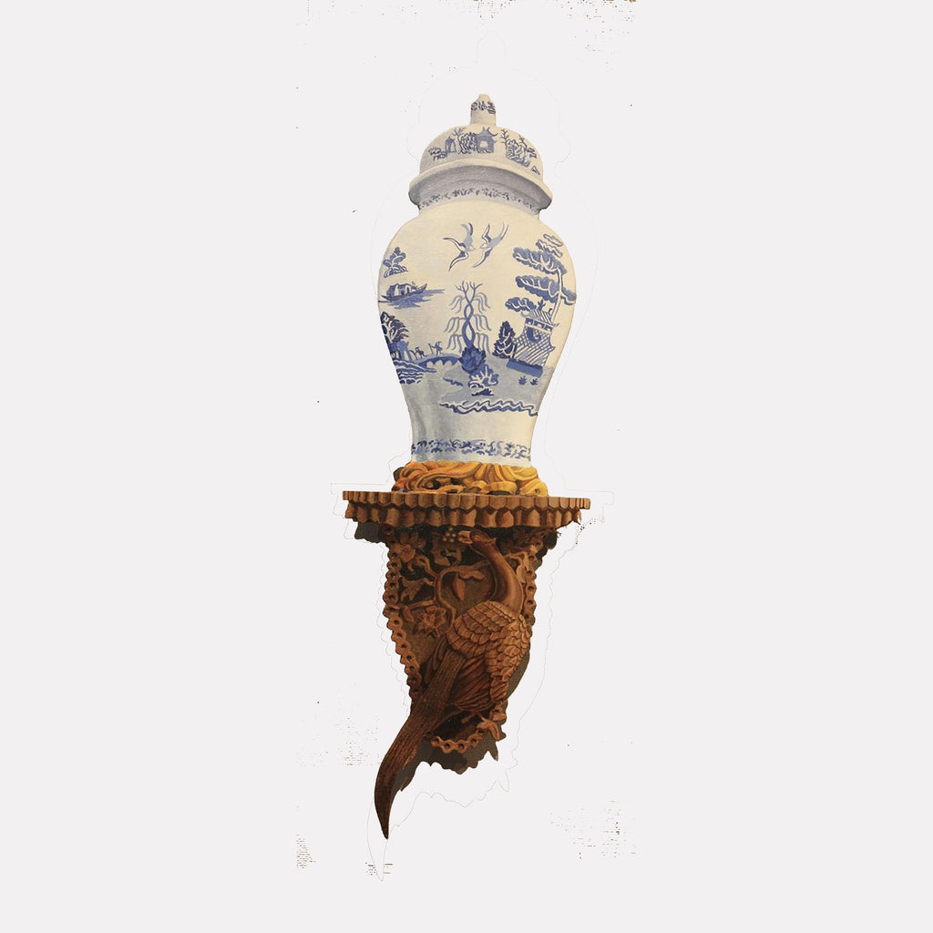 The artwork "Blue Willow" by Carl Chaiet, gallery position 1, features a classic porcelain vase adorned with intricate blue chinoiserie motifs depicting birds, pagodas, and willow trees. The vase rests on an ornately carved wooden bracket with detailed textures, reminiscent of the refined elegance and craftsmanship found in the works of Joseph Paxton and William Morris.