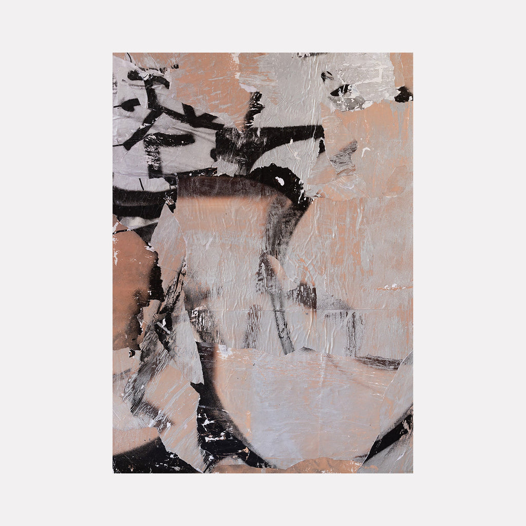 The artwork "Blush Graffiti" by Amy Turner features an abstract composition with layered textures and torn paper effects in soft blush pink, muted gray, and bold black brushstrokes. The piece combines rough, distressed elements with smooth, overlapping shapes creating a dynamic urban street art aesthetic.