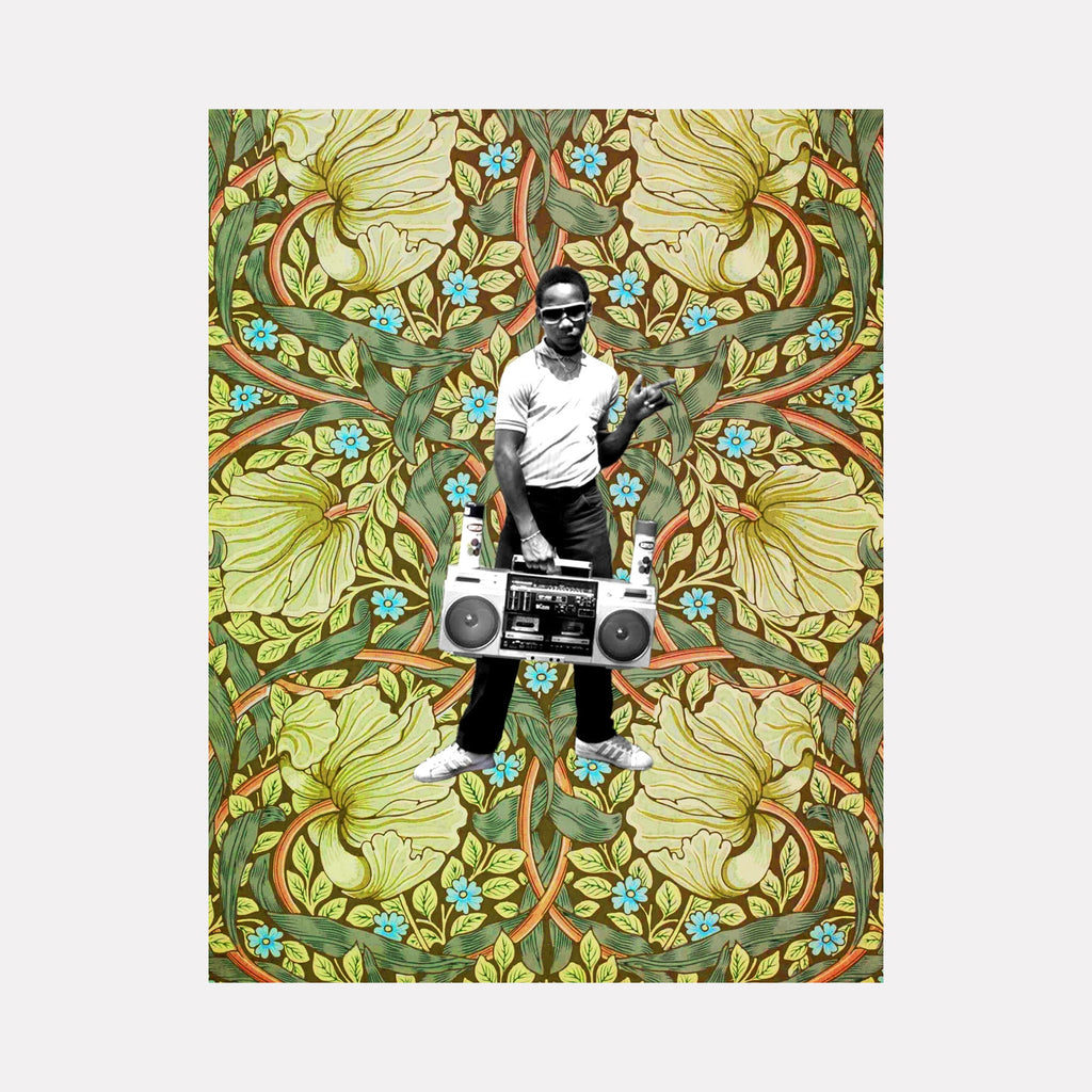 The artwork "Boombox #1" features a black-and-white image of a man wearing sunglasses, holding a large vintage boombox, set against a vibrant, detailed background of large green and beige floral patterns with intertwined stems and small blue flowers. The intricate textures and retro style create a striking contrast. By Theresa Gooby.