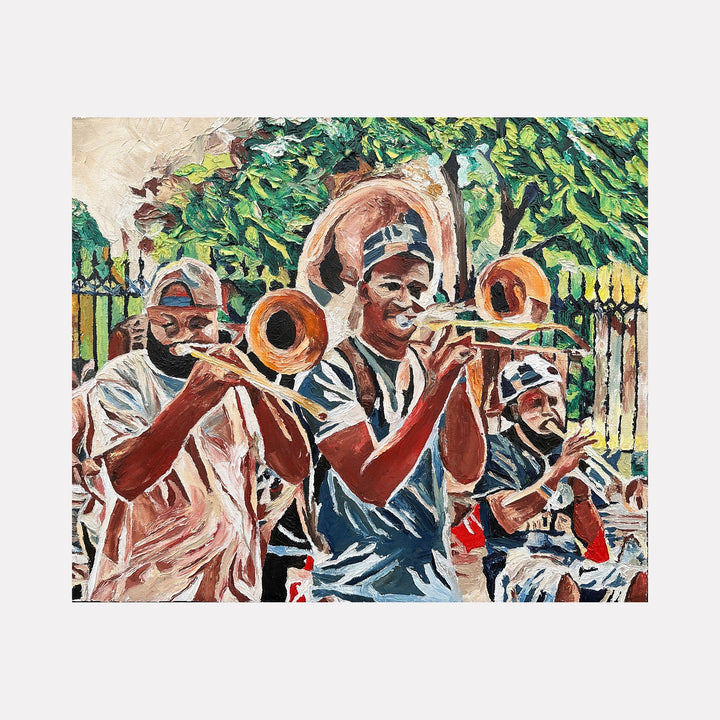 The artwork "Iron & Brass" depicts three musicians playing brass instruments in an outdoor setting with lush green trees and a wrought iron fence in the background. The oil painting features vibrant colors and textured brushstrokes emphasizing the lively scene. Product by Lauren Luna.