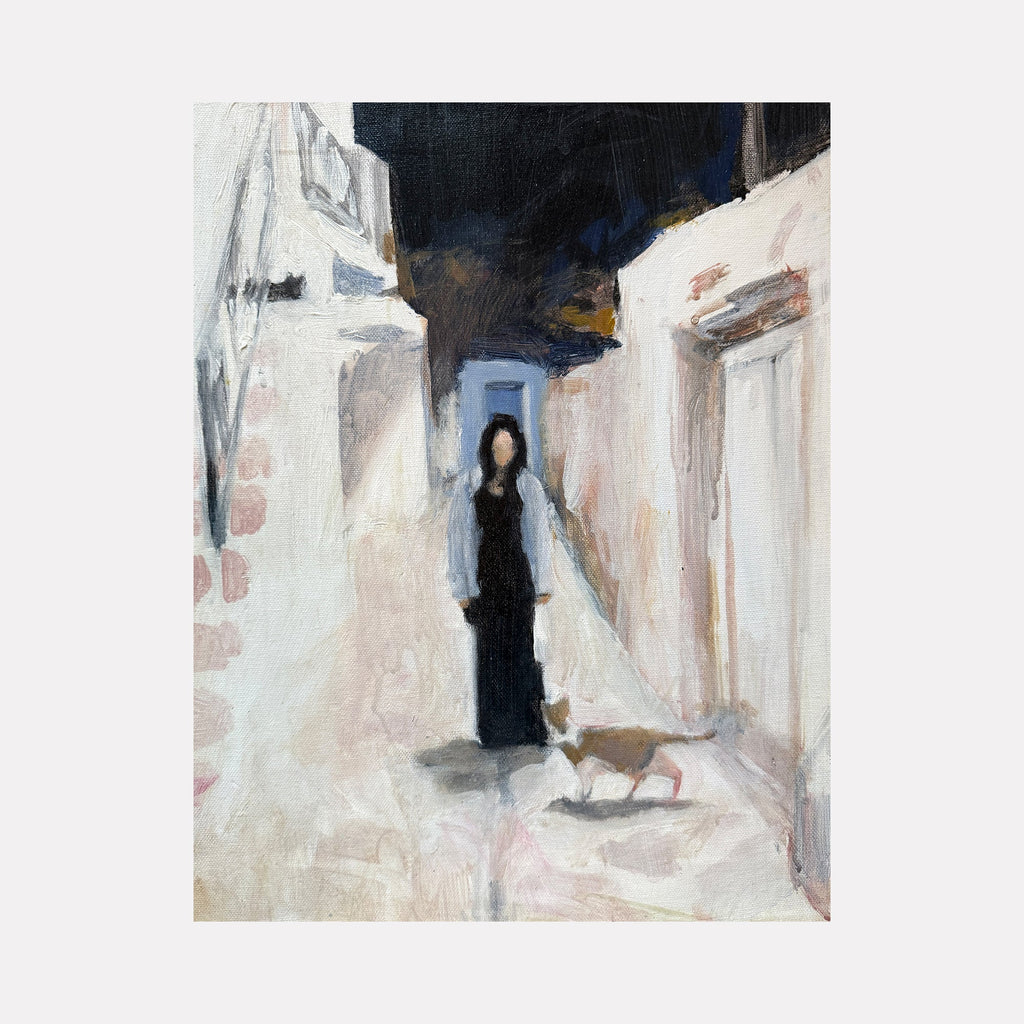 The artwork "Cat" by Chris Baily features a softly blurred figure dressed in black standing in a narrow, light-filled alleyway alongside a small cat. The muted palette of creams, grays, and black with textured brushstrokes evokes an atmospheric, almost dreamlike quality reminiscent of Edward Hopper’s urban scenes and Gerhard Richter’s blurred figurative paintings.