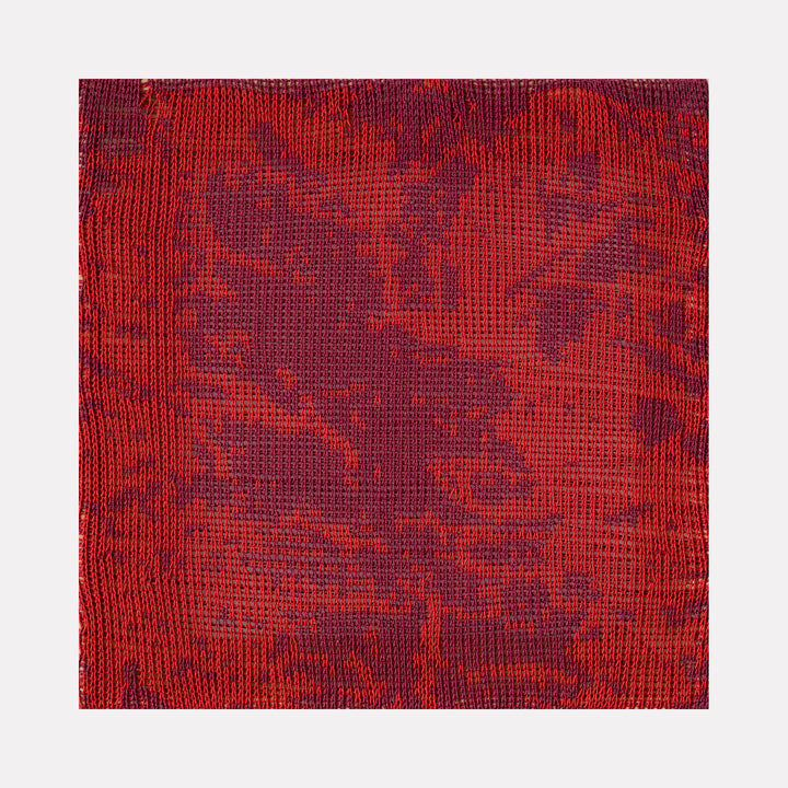 Computational Bark (#1) by Craftwork presents an abstract textile artwork blending deep reds and purples with intricate woven textures, evoking organic patterns and a tactile sense of depth in a bold, contemporary art piece.