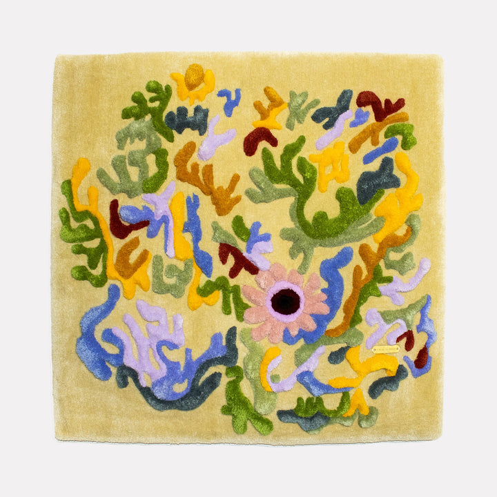 The artwork "Coral Flowers" by Abigail Henthorne features an abstract composition of organic, coral-like shapes in vibrant hues of green, yellow, blue, lavender, and warm earth tones against a soft cream background. The textured, flowing forms evoke the biomorphic abstraction of Henri Matisse and the vivid natural rhythms seen in Joan Miró’s playful works.