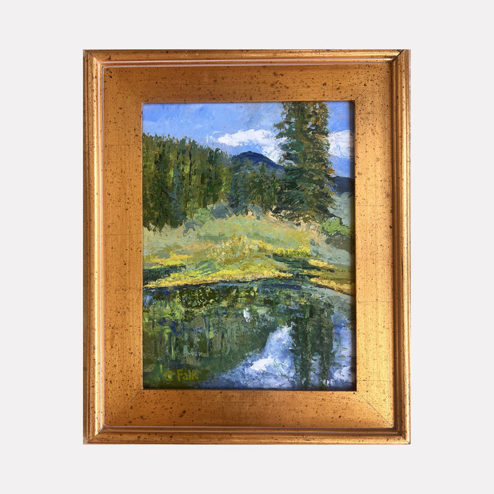 The artwork "Cowles Ponds" by Connie Falk features a serene landscape with a reflective pond surrounded by lush greenery and tall pine trees under a bright blue sky with soft clouds. The textured brushstrokes and natural color palette evoke styles reminiscent of the Impressionist masters like Claude Monet, emphasizing light and nature's tranquility.