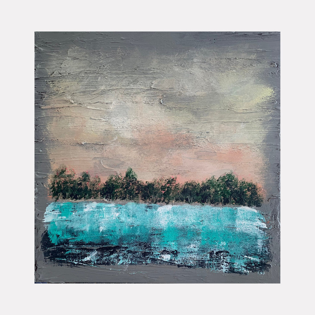 The artwork "Dreaming Of Life" by Tammy Kushnir features an abstract landscape with textured brushstrokes depicting a blurred treeline in dark green and black hues above vivid turquoise water, set against a muted sky of gray and soft pink tones. The piece combines rough texture and layered paint to evoke a dreamy, serene atmosphere.