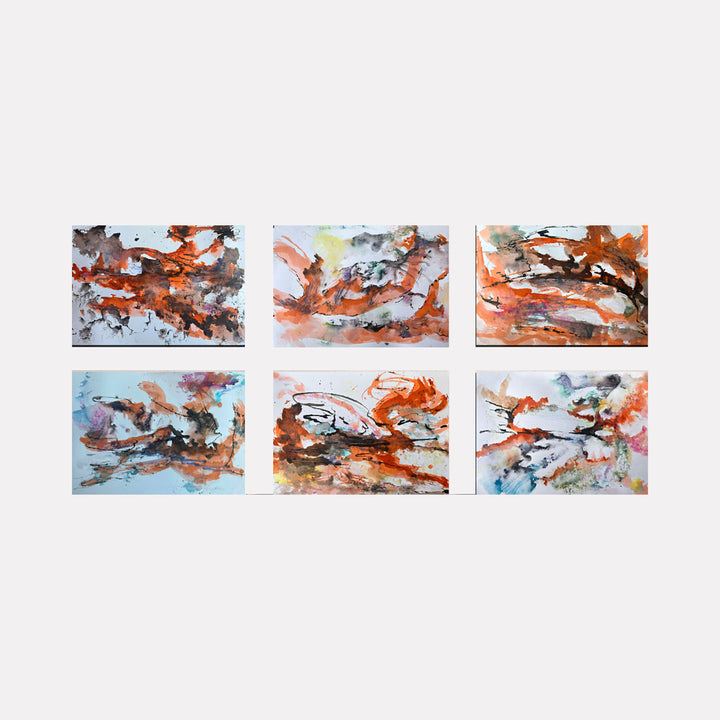 Emotional Landscapes by Dionysia Adamopoulou consists of six abstract compositions featuring fluid brushstrokes in warm oranges, soft blues, muted grays, and subtle pinks. The artworks evoke a flowing sense of natural movement and emotional depth through layered washes and dynamic, organic forms.