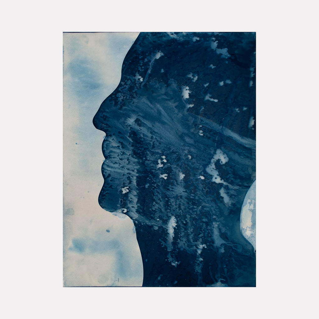 The artwork "Figure Study #12C" by Cat Welch features an abstract profile silhouette in deep blue and indigo tones. The textured surface resembles watercolor and ink washes, creating a fluid, ethereal effect reminiscent of works by Helen Frankenthaler and Yves Klein. The contrast between dark blues and lighter areas evokes a serene, contemplative mood.