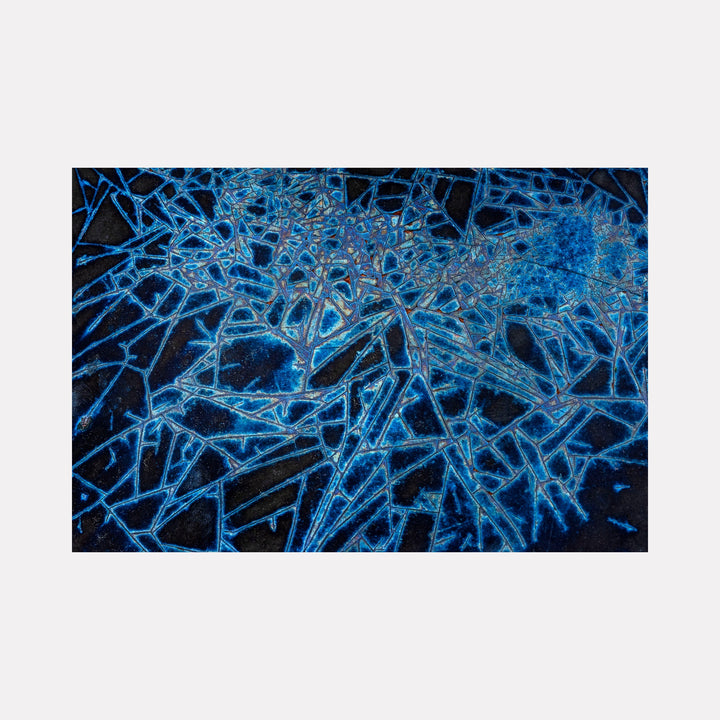 Form and Substance in Blue by Steve Edson showcases an intricate network of luminous blue lines and shapes layered over a deep black background, evoking a complex, abstract pattern that suggests crystalline structures or organic webs with a striking interplay of light and shadow in a contemporary artistic style.