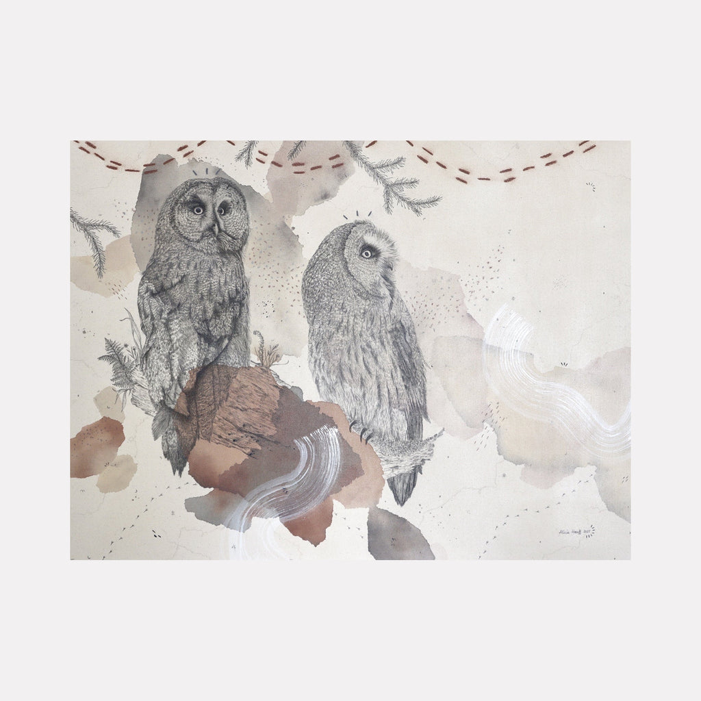 The artwork "Great Gray Owl, Magisterial Giant of the North" features two detailed gray owls perched on natural elements with soft neutral tones, delicate textures, and subtle abstract washes of brown and beige. The intricate feather details and muted background create a serene, majestic atmosphere. By Alicia Hauff.