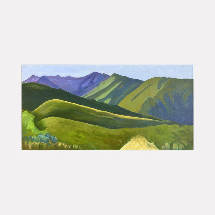 The artwork "Green Hills" by Connie Falk depicts rolling hills in shades of vibrant green with hints of yellow under a soft blue sky. The composition uses smooth brushstrokes and layered textures reminiscent of the landscape works of Georgia O'Keeffe and the serene natural scenes found in early American modernism.