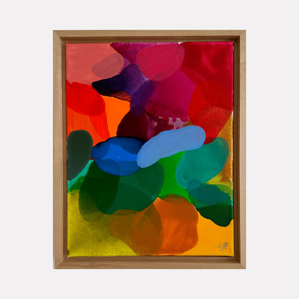 Hearts Desire 3 by Shiri Phillips features an expressive burst of vibrant overlapping shapes in rich reds, blues, greens, and oranges. The dynamic layering and soft-edged forms create a lively and passionate abstract composition with a radiant warmth and fluid sense of depth.