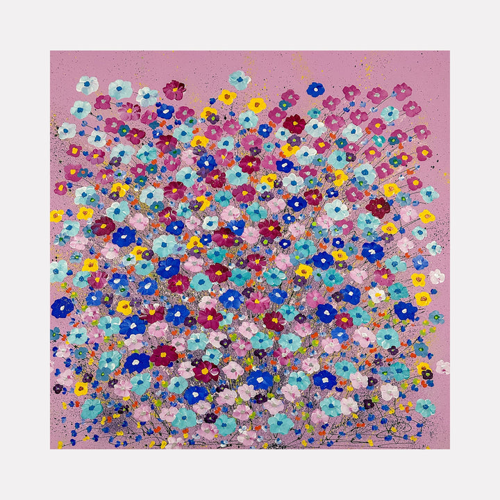 The artwork "Honeybee Hangout" features a dense cluster of vibrant, multicolored flowers in shades of blue, pink, yellow, and white against a soft pink background. The composition, with its pointillist and impressionistic influence reminiscent of Claude Monet’s floral studies, uses textured paint dabs to create depth and movement. Dorothea Sandra.