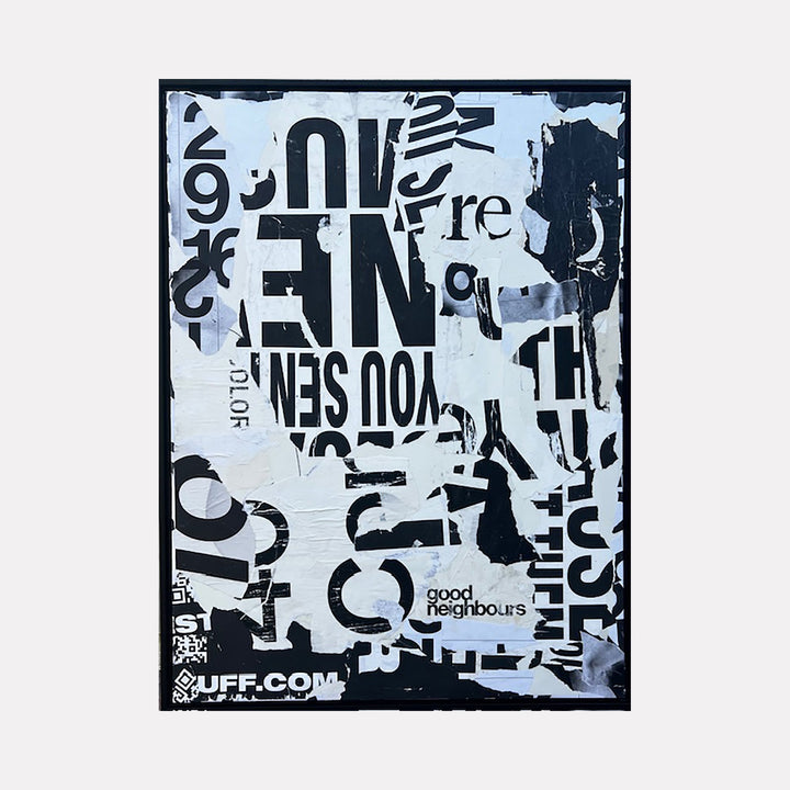 The artwork IMG_2157 by Amy Turner features a monochromatic collage of torn paper and fragmented text in bold black and white. The composition reflects an abstract, urban street art style reminiscent of Robert Rauschenberg's combines, with layered textures and overlapping typography creating a dynamic, textured visual narrative focused on contrast and fragmentation.