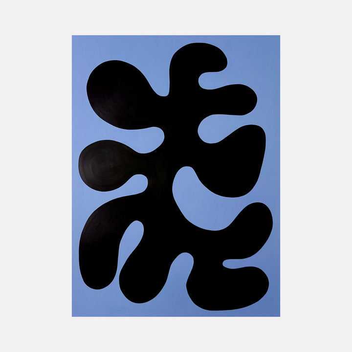 In Bloom by Shadia Sabagh features an abstract organic black shape with flowing, rounded forms set against a cool blue background, creating a striking contrast that evokes a sense of modern simplicity and fluid movement.