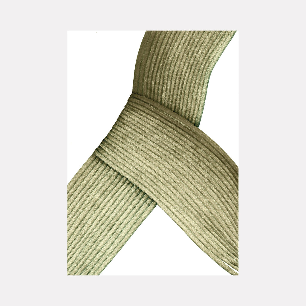 The artwork "Intersecting" by Alina Glotova features a minimal composition with two overlapping textured bands in muted green tones. The linear ribbed patterns and the subtle interplay of light and shadow evoke a sense of calm balance, reminiscent of minimalist works by Agnes Martin and the tactile simplicity found in Donald Judd’s sculptures.