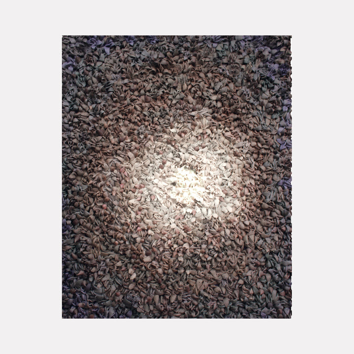 The artwork "Ingress" by Seren Morey features a dense cluster of twisted, leaf-like forms in muted earthy tones with a gradual brightening toward the center, evoking a radiant focal point. The intricate texture and organic shapes recall the tactile complexity of artists like Anselm Kiefer and the abstract light play reminiscent of Mark Rothko's color fields.