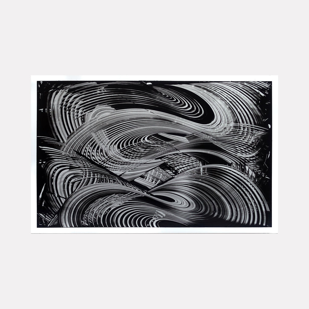 The artwork "220619" by John Cox features a dynamic black and white abstract composition with sweeping curved lines and layered concentric patterns creating a sense of movement and depth. The textured brushstrokes and rhythmic forms evoke expressionist landscapes reminiscent of the fluid abstraction found in works by Gerhard Richter and Franz Kline.