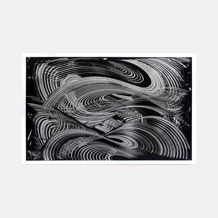 The artwork "220619" by John Cox features a dynamic black and white abstract composition with sweeping curved lines and layered concentric patterns creating a sense of movement and depth. The textured brushstrokes and rhythmic forms evoke expressionist landscapes reminiscent of the fluid abstraction found in works by Gerhard Richter and Franz Kline.