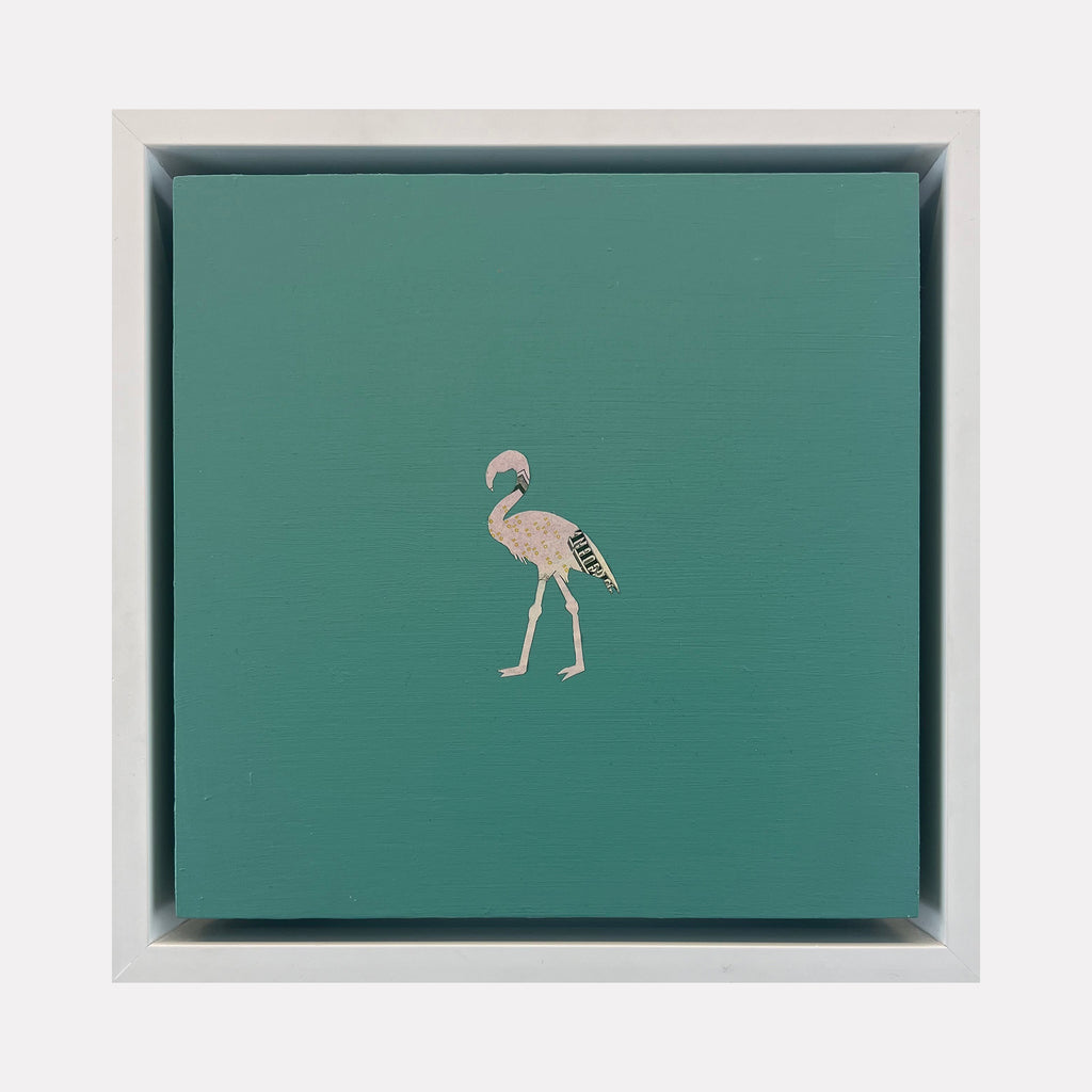 The artwork "Profit Margins, Flamingo" by Jacki Davis features a small, stylized flamingo crafted from US currency with intricate details, set against a solid teal acrylic background on an 8x8 inch wood panel, highlighting texture contrast and minimalist design.