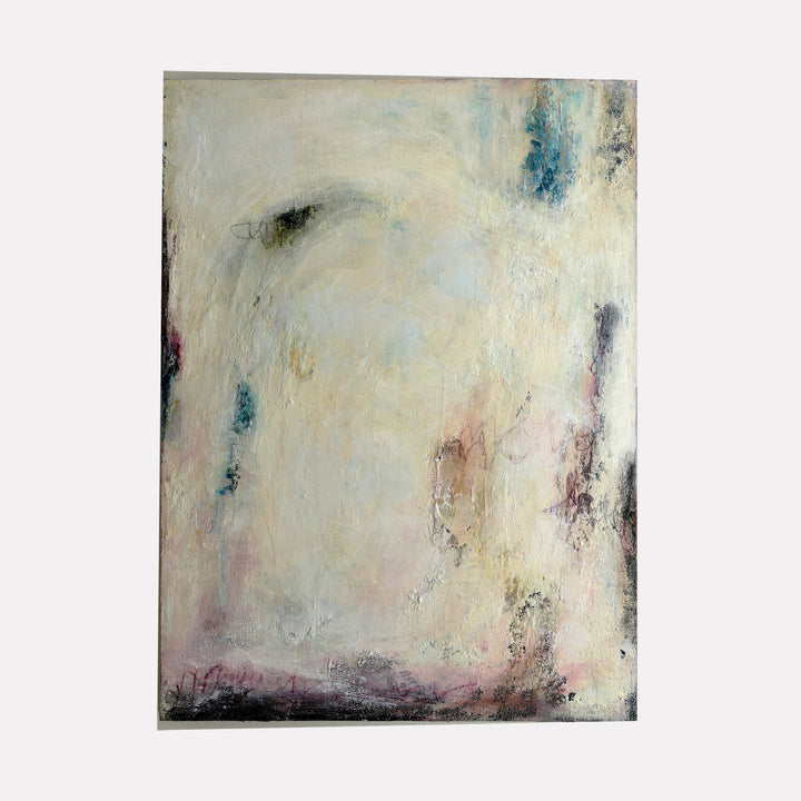 The artwork "Kindness" by Deborah Chaney features an abstract composition with soft, muted tones of cream, beige, and pastel pinks accented by deeper blues and dark smudges. The textured surface and subtle layering evoke the ethereal styles reminiscent of Mark Rothko and Helen Frankenthaler, blending emotion and form in a contemplative, serene manner.