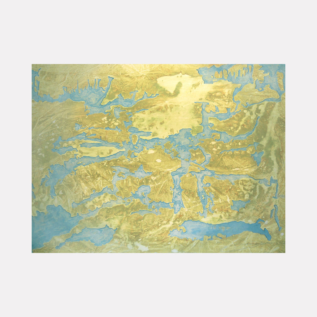 The artwork "Martians About to Land on Disappearing Island" by Marlene Struss features an abstract landscape with shimmering gold and muted blue hues, creating an ethereal map-like texture that suggests a vanishing island surrounded by water. The composition evokes a sense of mystery and otherworldly exploration. Marlene Struss.