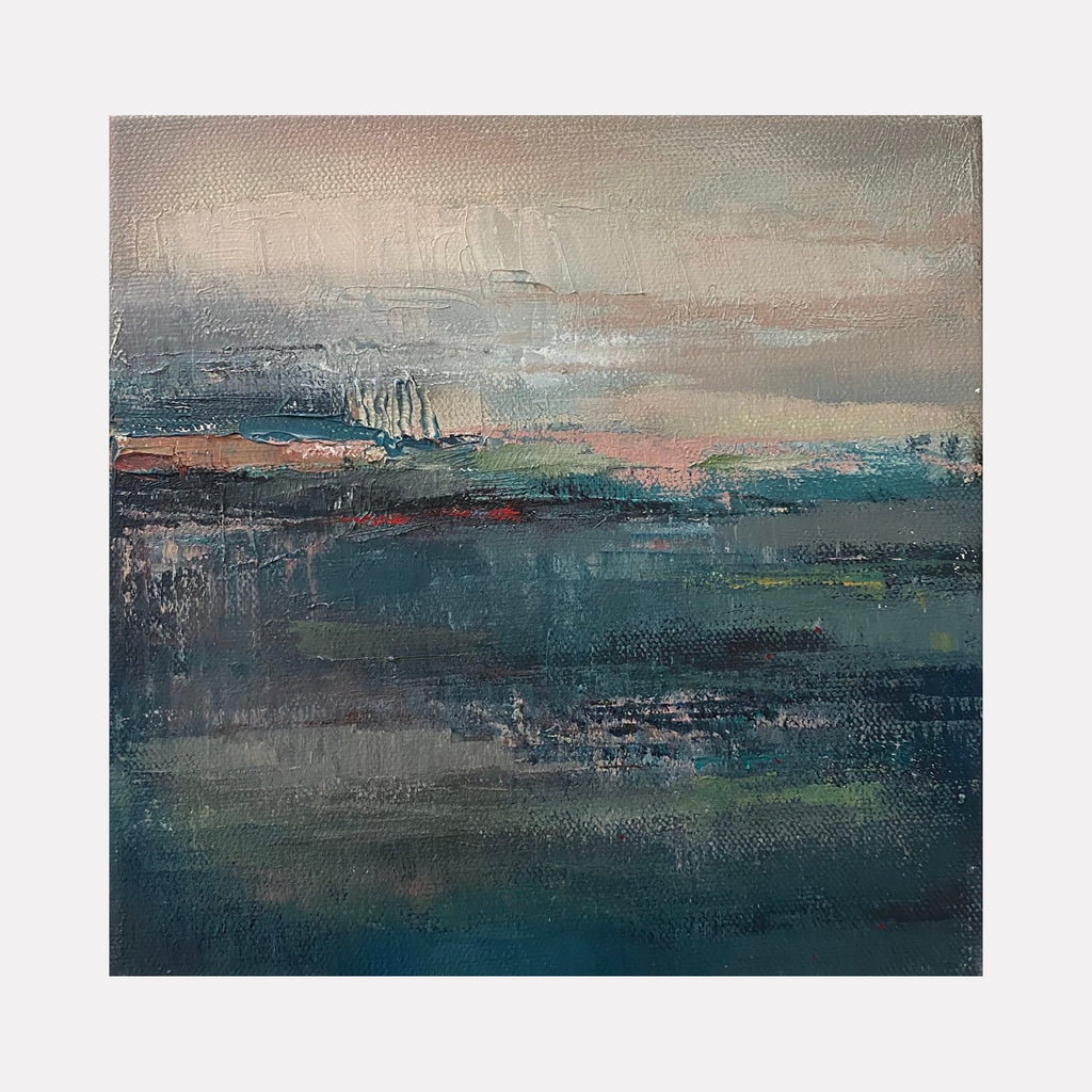 The artwork "Mid of April" by Xanthippe Tsalimi features an abstract landscape with layered textures in muted blues, grays, and soft peach tones. The composition evokes a tranquil, cold atmosphere reminiscent of early morning light over water, blending painterly brushstrokes and subtle color gradations in a style akin to J. M. W. Turner’s atmospheric works and the abstract expressionism of Mark Rothko.