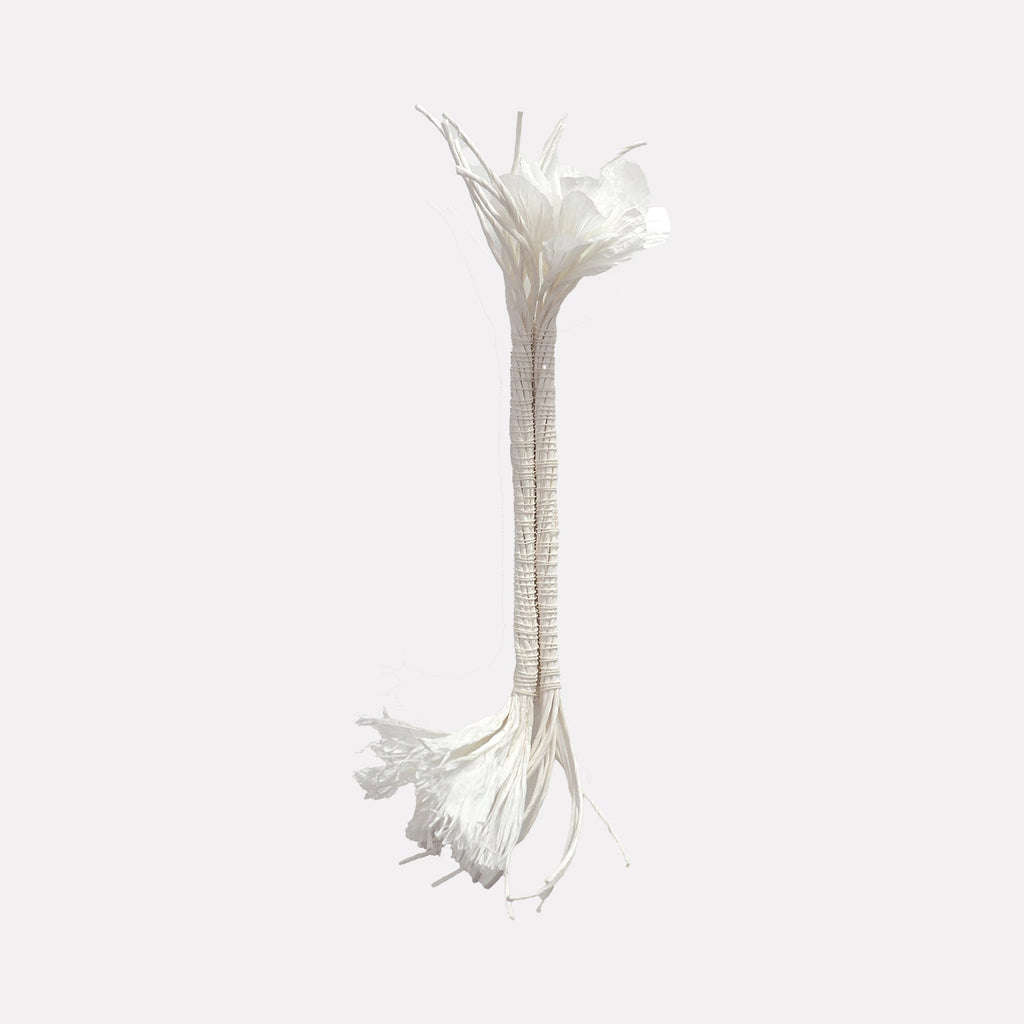 The artwork "Two For You" by Morgan Hale features an elegant, elongated white form resembling intertwined natural fibers or petals bound tightly in the center, creating a balanced vertical composition. The texture and delicate detail evoke minimalist and organic styles similar to works by Eva Hesse, emphasizing simplicity and tactile beauty.