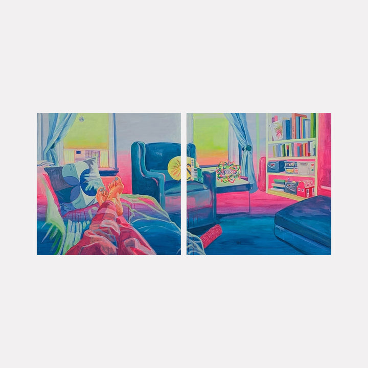The artwork "Morning Visions" depicts a cozy living room scene bathed in vibrant pastel colors with shades of blue, pink, and yellow. It features textured cushions, a soft blanket, armchairs, bookshelves, and sunlight streaming through sheer curtains, reminiscent of the warmth and color palette found in works by David Hockney. By Mary Younkin.