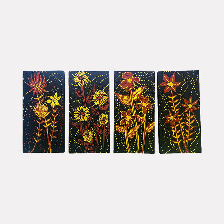 Night Garden by Sunny Chapman is a Curina art piece featuring four panels with stylized flowers in warm reds, yellows, and oranges on a deep blue background, accented by delicate dotted patterns creating a lively, textured abstract floral design.