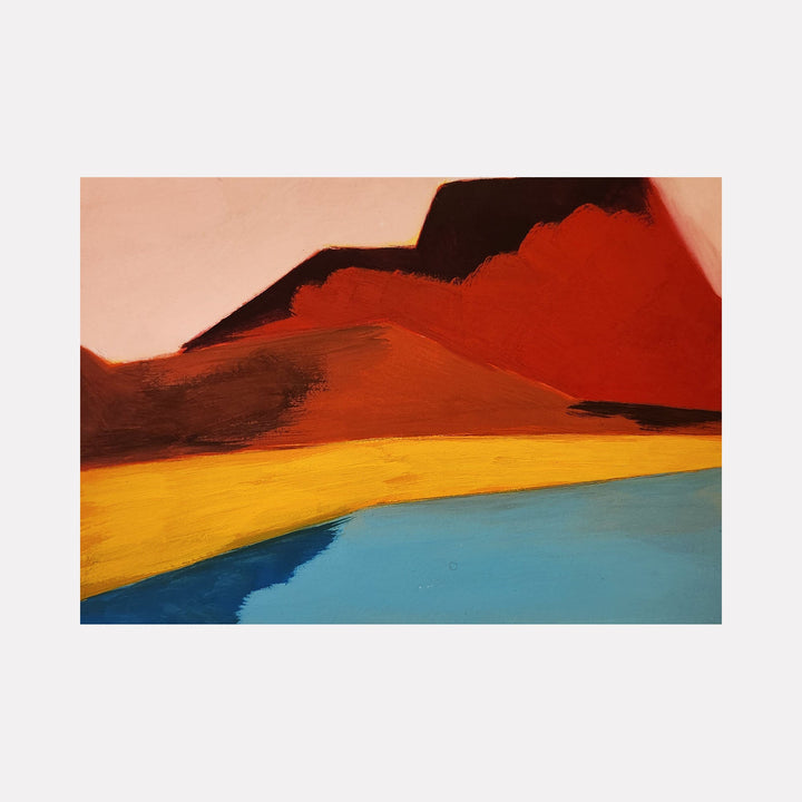 The artwork 'Nowhere?' features a bold abstract landscape with vibrant color blocks. Deep crimson mountains rise against a coral sky, while a golden yellow plain stretches toward a serene turquoise water body below. Created with acrylic gouache on cotton paper by Joanie Flickinger, the piece displays strong geometric forms and dramatic color contrasts.