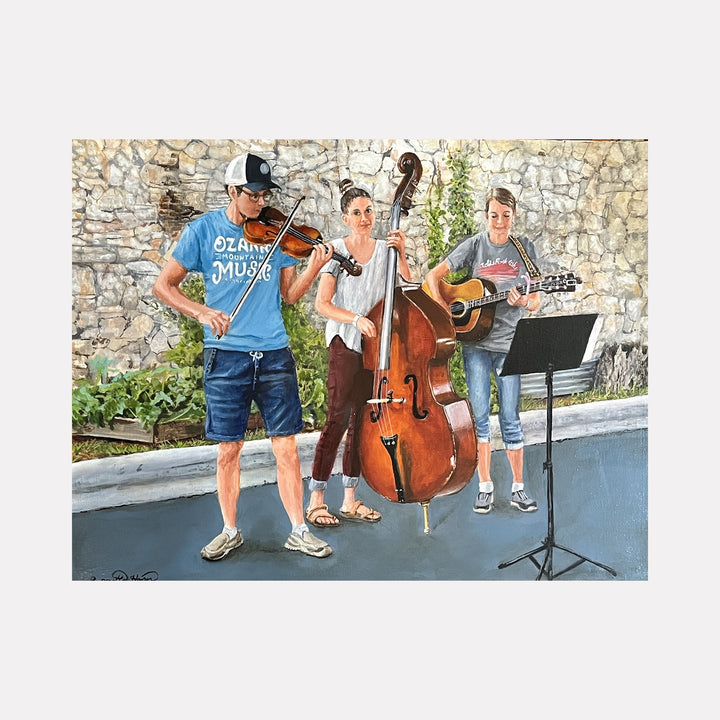 Ozark Mountain Musicians: Three musicians with violin, upright bass and guitar perform against stone wall backdrop by Lynnette Horn