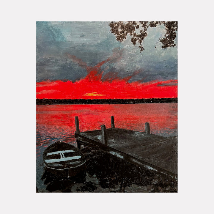 The artwork "Paint It Red" depicts a dramatic lakeside scene at sunset with vivid red and orange hues dominating the sky and reflecting on the water. A small boat is moored next to a wooden dock under dark, moody clouds, reminiscent of the atmospheric style of J.M.W. Turner. Created by Robert Dec.