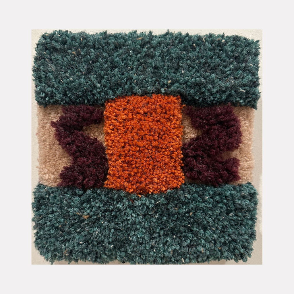 The artwork "Ponte (Bridge)" by Ana Maria Farina features a textured, tufted design with a central rectangular orange section flanked by dark purple abstract shapes, all bordered by deep teal green on the top and bottom, and beige background areas. The piece highlights a tactile, woven material with vivid colors and geometric forms. Ana Maria Farina