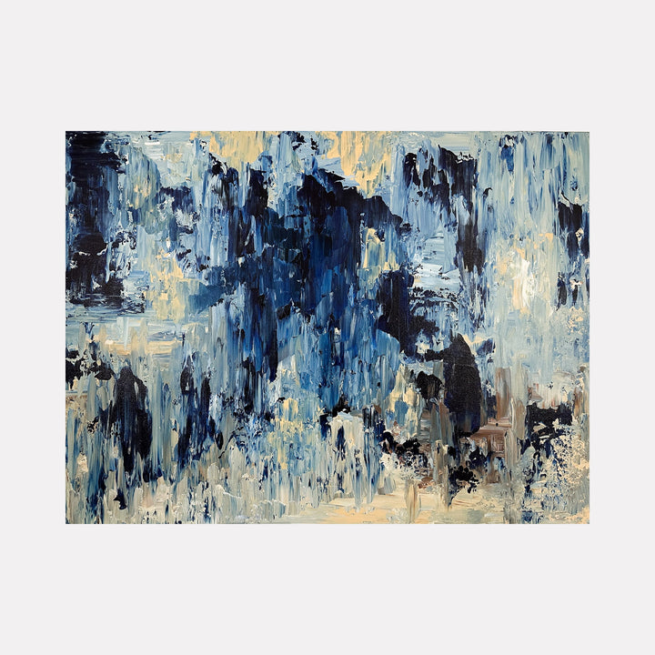 The artwork "Powerful Joy" features an abstract composition with thick, textured brushstrokes in varying shades of blue, cream, and black, evoking a sense of movement and depth reminiscent of works by Gerhard Richter. The dynamic layering and blending of colors create an expressive, modern style. Dorothea Sandra.