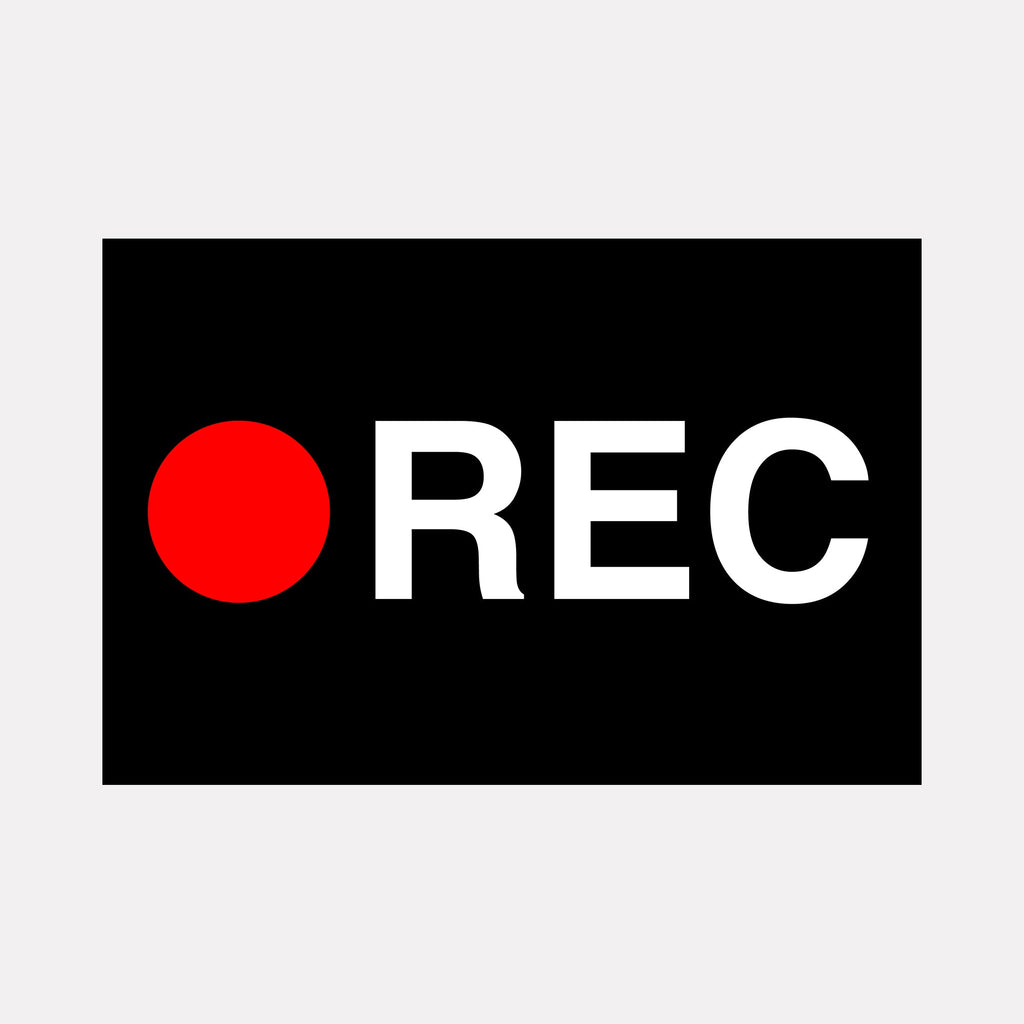 The artwork "REC" by Harold Herb features a bold, minimalist design with a vivid red circle paired with stark white letters on a deep black background. The clean geometric layout and striking color contrast evoke the precision and graphic simplicity found in the works of Josef Müller-Brockmann and Swiss modernist poster design.