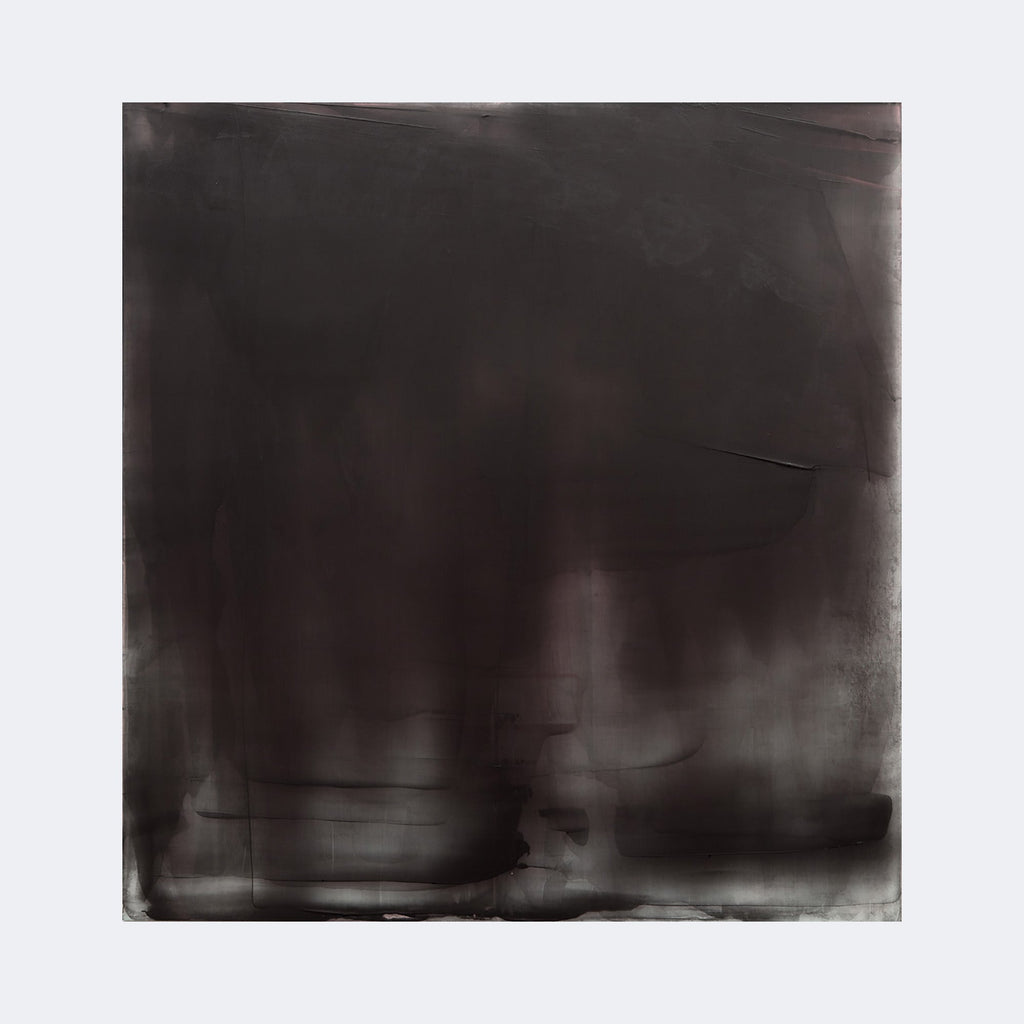 The artwork "Graphite Veil 6" by Debra Ramsay features a large, square abstract composition dominated by deep, muted graphite tones with subtle gradations and faint linear textures. The piece evokes the atmospheric quality and moody minimalism reminiscent of Mark Rothko's dark color fields, presenting a veil-like layering that suggests depth and shadow.
