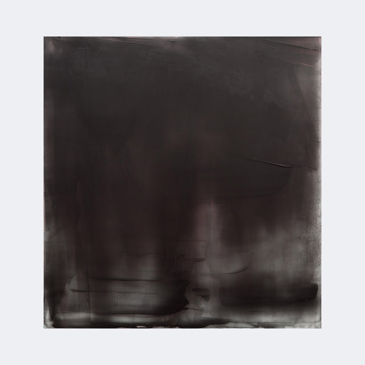 The artwork "Graphite Veil 6" by Debra Ramsay features a large, square abstract composition dominated by deep, muted graphite tones with subtle gradations and faint linear textures. The piece evokes the atmospheric quality and moody minimalism reminiscent of Mark Rothko's dark color fields, presenting a veil-like layering that suggests depth and shadow.