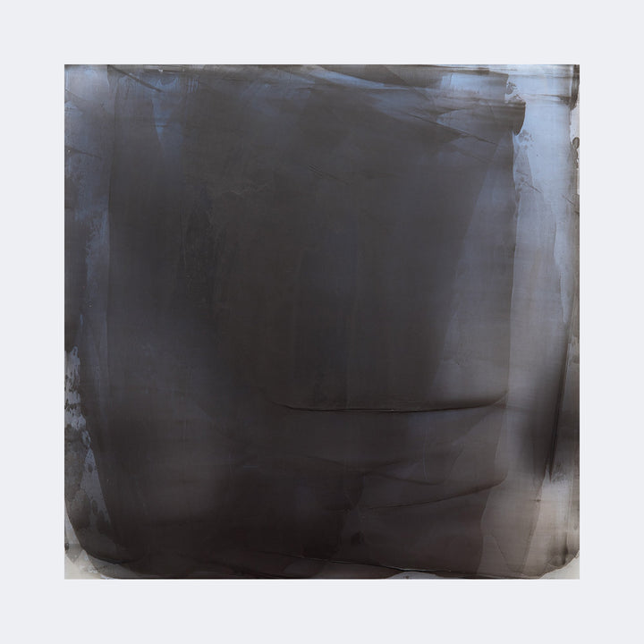 The artwork "Graphite Veil 8" by Debra Ramsay features a layered, translucent composition dominated by deep graphite gray hues with soft gradients and subtle textures. The abstract style, evoking the atmospheric minimalism of Agnes Martin and the tonal depth of Mark Rothko, creates a contemplative veiled effect reminiscent of soft veils or smoke.