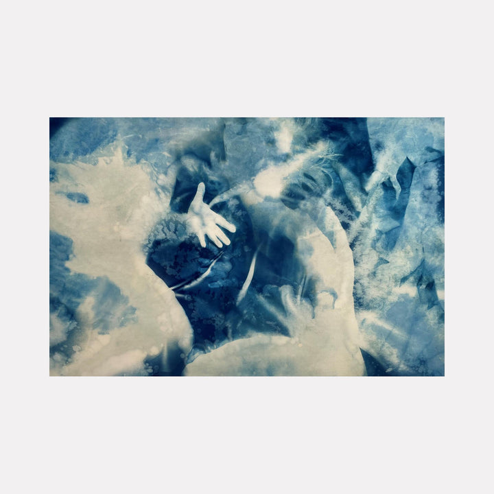 The artwork "Reach" by Cat Welch features an ethereal blend of blue and white hues with ghostly, overlapping human forms and an outstretched hand emerging from a textured, almost watercolor-like background. The style evokes the haunting surrealism of Salvador Dalí combined with the blurred motion reminiscent of Gerhard Richter’s abstract portraits.
