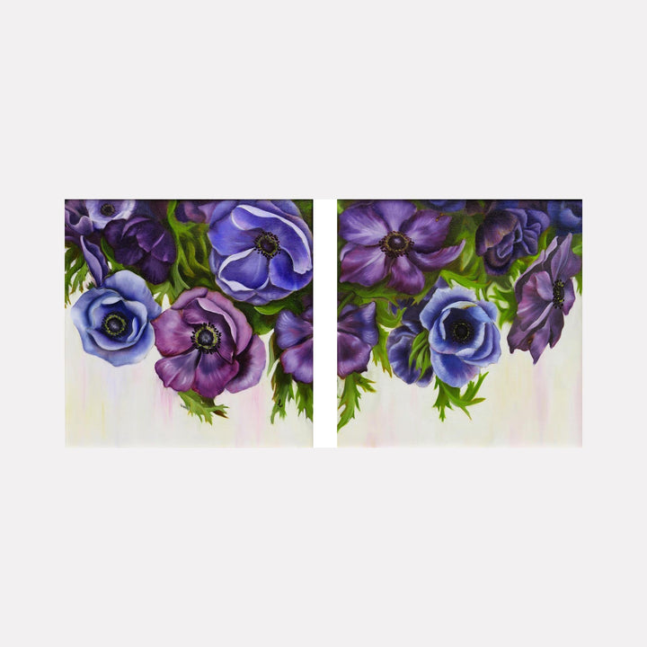 The artwork "Rhapsody Diptych" by Carla Thomson features a vibrant arrangement of purple and blue anemone flowers with detailed petals and dark centers, set against a soft, light background. The piece’s rich textures and bold color contrasts evoke the floral realism of Georgia O’Keeffe and the delicate brushwork reminiscent of Impressionist painters.