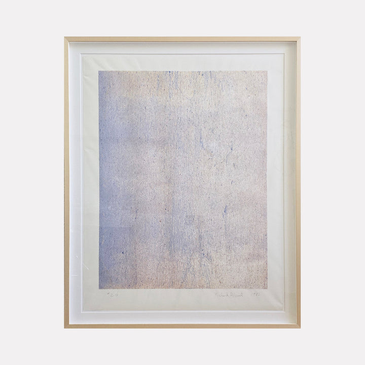 The artwork "Skywall #20" by Richard Alpert features a textured abstract composition with soft, muted hues of blue and beige. The piece evokes a serene, weathered surface reminiscent of minimalist and color field painters such as Mark Rothko or Agnes Martin, emphasizing subtle gradations and a contemplative atmosphere within a simple rectangular frame.