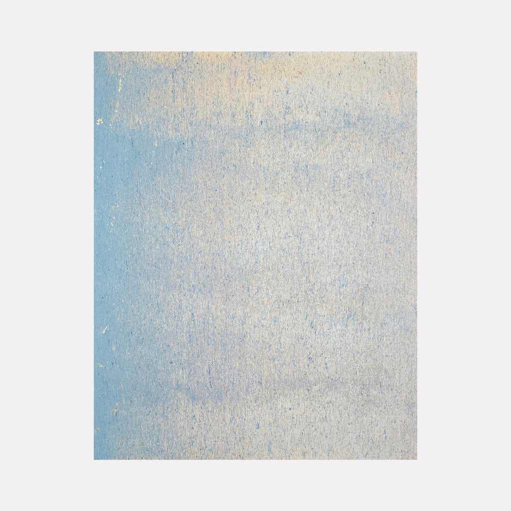The artwork "Skywall #21" by Richard Alpert features a textured gradient of soft blues and sandy beige tones, evoking a serene sky or weathered wall. The subtle layering and delicate speckled surface recall the abstract minimalism of Agnes Martin and the quiet atmospheric qualities found in works by Mark Rothko, creating a contemplative and tranquil visual experience.