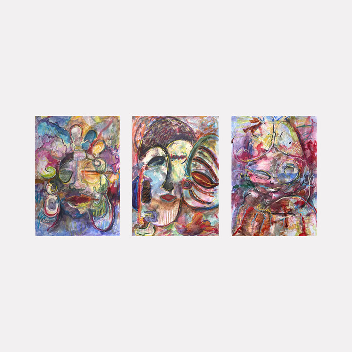 Rites of Passage (Triptych) by Dionysia Adamopoulou features a trio of abstract faces rendered with expressive brushstrokes in vibrant reds, blues, and earthy tones. The layered, swirling forms evoke a sense of emotional complexity and transformation, blending contemplative portraiture with a dynamic, modernist style.